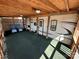 Spacious deck with wooden beams, carpet and seating at 113 Cedar Ln, New London, NC 28127