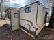 Exterior of home with camper at 113 Cedar Ln, New London, NC 28127