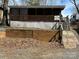 Charming single-story home with a screened porch and wood accents at 113 Cedar Ln, New London, NC 28127