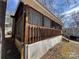Exterior of home with screened in porch and deck at 113 Cedar Ln, New London, NC 28127