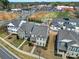 Aerial view of well-maintained homes in a suburban neighborhood, near shopping and dining at 117 Stowe Rd, Belmont, NC 28012