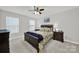 Bedroom with ceiling fan and lots of natural light at 117 Stowe Rd, Belmont, NC 28012