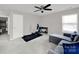 This bedroom with ceiling fan, doorway to a bathroom and a workout machine at 117 Stowe Rd, Belmont, NC 28012