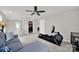 Bright bonus room featuring comfortable seating and exercise equipment at 117 Stowe Rd, Belmont, NC 28012