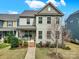Charming two-story home with inviting front porch and well-manicured lawn at 117 Stowe Rd, Belmont, NC 28012