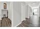 Well-lit hallway showcasing modern finishes, neutral tones, and seamless transitions throughout the home at 117 Stowe Rd, Belmont, NC 28012