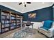 Office with custom shelving, stylish decor, and ample natural light at 117 Stowe Rd, Belmont, NC 28012