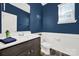 Stylish powder room with modern vanity and elegant fixtures at 117 Stowe Rd, Belmont, NC 28012