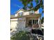 Charming two-story home featuring a two-car garage, welcoming entrance, and beautifully landscaped front yard at 14331 Evening Flight Ln, Charlotte, NC 28262