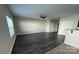 Spacious living room with neutral walls, modern ceiling fan, and bright natural light at 14331 Evening Flight Ln, Charlotte, NC 28262
