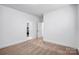 Bright bedroom featuring plush carpet, neutral walls and an adjoining bathroom at 15818 Sparrowridge Ct, Charlotte, NC 28278