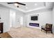 Cozy living room with a modern fireplace, TV, and comfortable seating, creating a relaxing atmosphere at 15818 Sparrowridge Ct, Charlotte, NC 28278