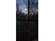 A dark view from a window of a decorated tower at night at 1607 Harrill St, Charlotte, NC 28205
