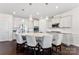 Bright and airy kitchen featuring a large center island, stainless appliances, and ample cabinet space at 16617 Cozy Cove Rd, Charlotte, NC 28278