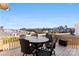 Outdoor patio with dining set and neighborhood views at 16617 Cozy Cove Rd, Charlotte, NC 28278