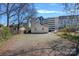 Expansive backyard area with gravel ground, a small garage, and ample space for outdoor activities at 1714 S Tryon St, Charlotte, NC 28203