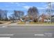 Charming single-Gathering home with a front porch and a well-maintained lawn along a paved road at 1714 S Tryon St, Charlotte, NC 28203
