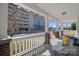 Relaxing front porch showcasing outdoor seating and views of the surrounding urban environment at 1714 S Tryon St, Charlotte, NC 28203