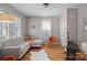 Inviting living room with modern furniture, hardwood floors, and bright accents at 1714 S Tryon St, Charlotte, NC 28203