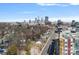 The downtown skyline is visible in the distance over a neighborhood and thoroughfare at 1714 S Tryon St, Charlotte, NC 28203