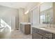 Luxurious bathroom with double vanity, modern fixtures, and a soaking tub at 182 Walking Horse Trl, Davidson, NC 28036