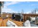 Spacious wooden deck featuring outdoor seating and two grills for enjoying the open air at 182 Walking Horse Trl, Davidson, NC 28036