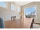 Bright and airy dining area with natural light and a view of the surrounding nature, perfect for Gathering gatherings at 182 Walking Horse Trl, Davidson, NC 28036