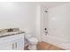 Bathroom featuring granite countertops, matte black hardware, and a shower-tub combo at 2095 Tite Rd, Stanfield, NC 28163