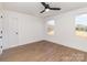 Bright bedroom featuring hardwood flooring and a well-lit interior with large windows at 2095 Tite Rd, Stanfield, NC 28163