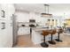 Spacious kitchen with a large island, modern lighting, and stainless steel appliances at 2095 Tite Rd, Stanfield, NC 28163