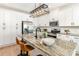 Bright kitchen with stainless steel appliances, kitchen island, and modern fixtures at 2095 Tite Rd, Stanfield, NC 28163