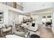 Open-concept living room with modern decor, lots of natural light, and seamless flow into the kitchen at 2095 Tite Rd, Stanfield, NC 28163