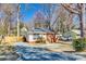 Charming single-story home with brick and siding, featuring a new fence and ample parking space at 2123 Purser Dr, Charlotte, NC 28215