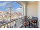 Outdoor balcony showcasing a charming table and chairs with a neighborhood view at 234 Iverson Way, Charlotte, NC 28203