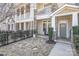 A charming entryway with a stone paver patio and walkway leads to the front door at 234 Iverson Way, Charlotte, NC 28203