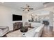 The cozy living room flows seamlessly into the kitchen and dining area, perfect for entertaining at 234 Iverson Way, Charlotte, NC 28203