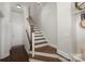 A clean, bright stairway with wooden steps and white risers ascends to the upper floors at 234 Iverson Way, Charlotte, NC 28203