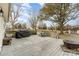 Expansive deck with barbecue grill and fire pit provides ideal setting for outdoor gatherings and leisure at 24697 Ramsey Dr, Albemarle, NC 28001