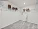 This walk-in closet features wire shelving and ample storage space at 253 Tackle Box Dr, Troutman, NC 28166