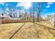 View of the large backyard with a wood fence to add privacy to the property at 2625 Larry Dr, Charlotte, NC 28214