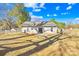 Spacious fenced backyard with a small patio and plenty of room to enjoy the outdoors at 2625 Larry Dr, Charlotte, NC 28214