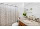 Bathroom features a granite countertop, framed mirror, and a shower with tub at 2625 Larry Dr, Charlotte, NC 28214
