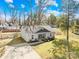 Charming single-story home with a manicured lawn, fresh landscaping, and inviting front porch at 2625 Larry Dr, Charlotte, NC 28214
