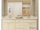 Bathroom featuring double vanity with white countertop and cabinets at 2810 Morning Song Way, Lancaster, SC 29720
