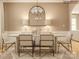 Formal dining room with table, six chairs, modern chandelier, and neutral decor at 2810 Morning Song Way, Lancaster, SC 29720