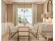 Bright dining room featuring table, six chairs, chandelier, large window, and neutral decor at 2810 Morning Song Way, Lancaster, SC 29720