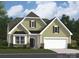 Charming one-story home with green siding, black shutters, and a two-car garage at 2810 Morning Song Way, Lancaster, SC 29720