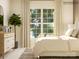 Bright main bedroom with a large window and a dresser at 2810 Morning Song Way, Lancaster, SC 29720