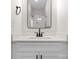 Bathroom featuring a white vanity and black hardware with a mirror reflecting the shower at 3206 Riley Ave, Charlotte, NC 28269