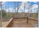 Wooden back deck overlooking a natural area with trees at 331 Wilkes Place Dr, Fort Mill, SC 29715
